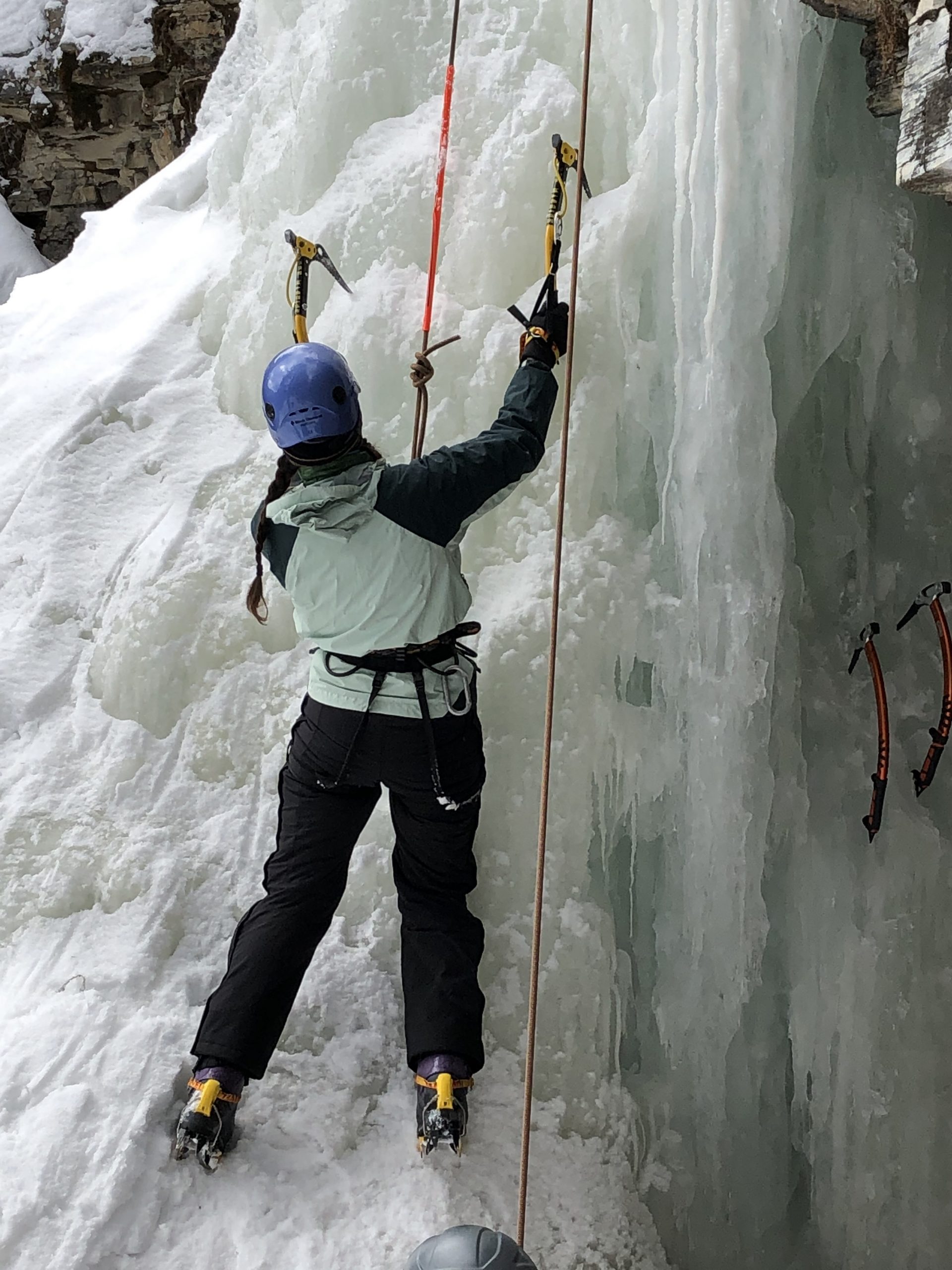 Nichole ice climbing