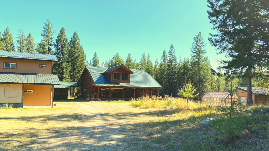 Log Cabin on 5 Acres with Shop Revel Real Estate